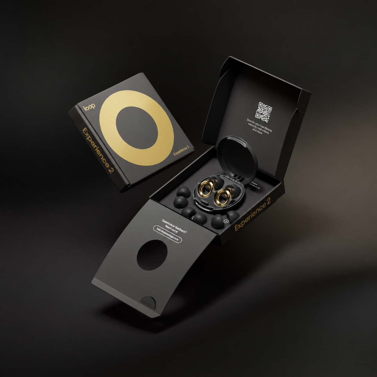 The earplugs with their packaging and carry case